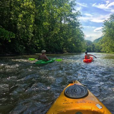 Kayakers float down Wheeling Creek