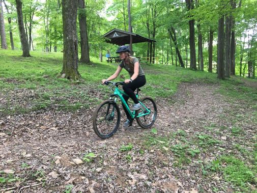 A mountain biker rides on the Westover Park Trail