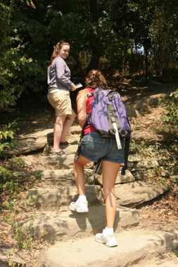 Two hikers make their way up a steep trail at Harpers Ferry