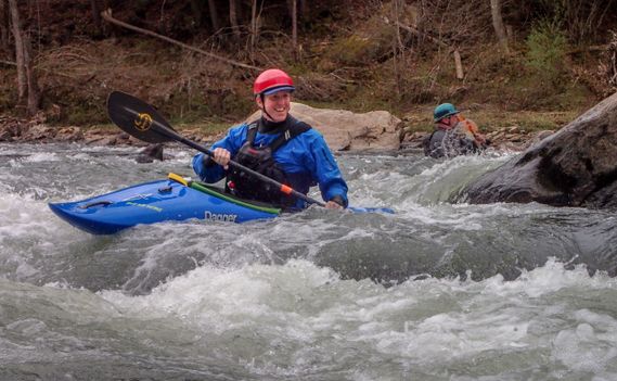 A kayaker paddles through a rapid on the Gauley River