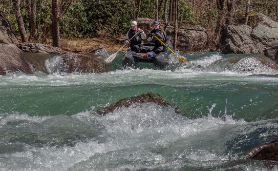 A Shredder goes over a small drop on the Buckhannon River