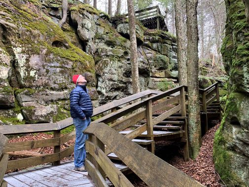 A person hikes amongst the rocks at Beartown State Park