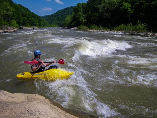 Chris Schwer plays in Galloway Beach, a featured play hole on the Arden Section of the Tygart.