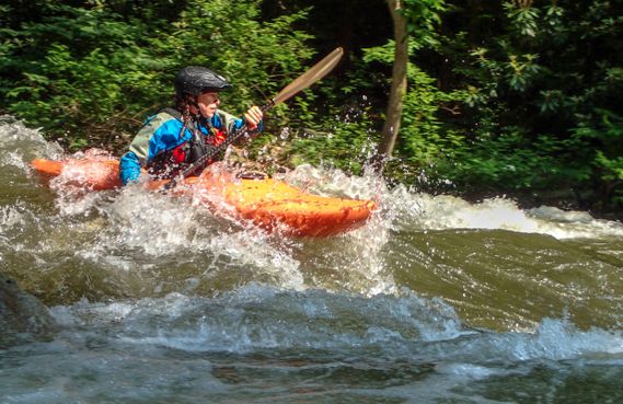 A kayaker paddles on the Savage River