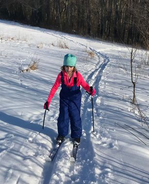 A young skier moves though the Big Field at Snake Hill WMA