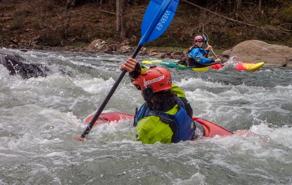 A kayaker surfs on the Gauley River