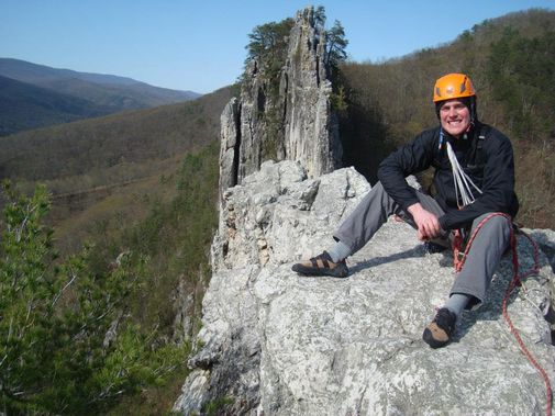 A climber on top of Seneca Rocks