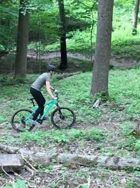 A mountain biker rides on the Westover Park Trail