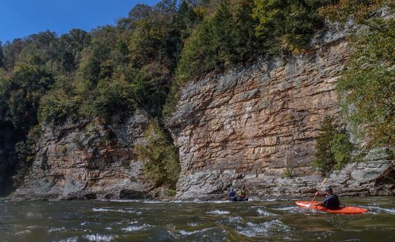 boaters paddle through the Canyon Doors Rapid on the Lower Gauley River