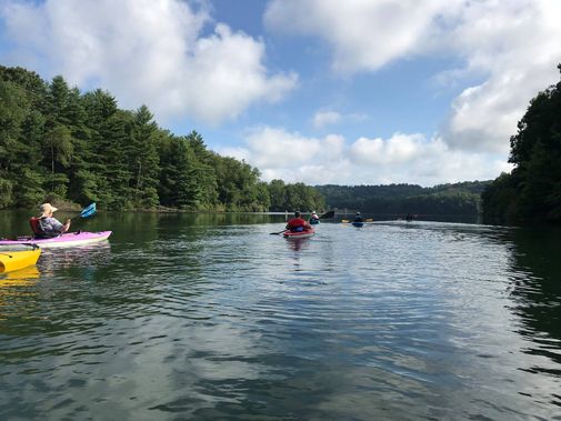 Kayakers paddle at Stonecoal Lake