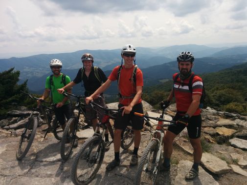 Mountain bikers stop for a view on top of Spruce Knob