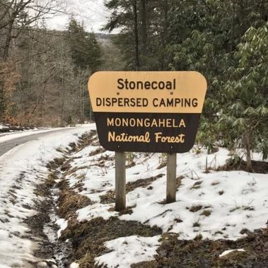 Stonecoal Disbursed Camping sign