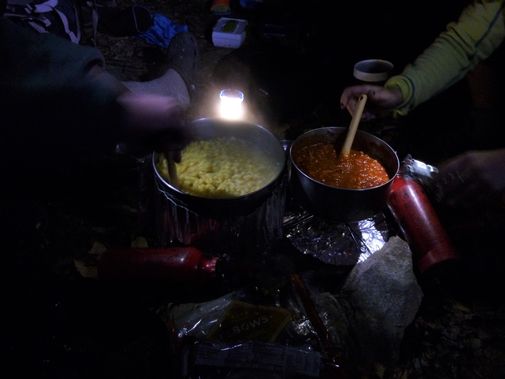 Cooking dinner on backpacking stoves