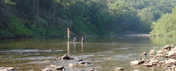 Kids with their dad wading in the South Branch of the Potomac River