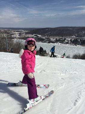 A child is ready to go over the edge of the ski slope at Wisp Resort
