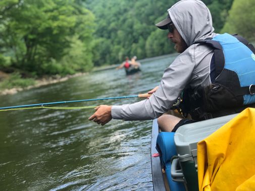 Fly fishing from a canoe on the Cheat River