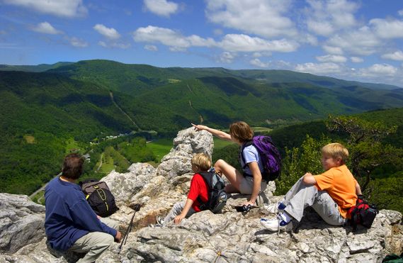 A family gets a view from the top of Seneca Rocks