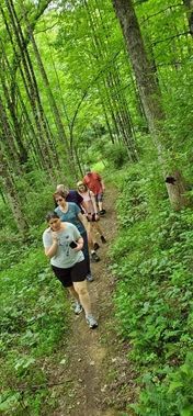 A group running at Upshur County Trails