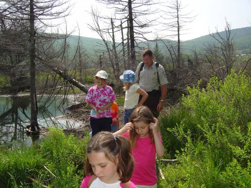 Children take a guided hike with a USFWS employee at Canaan Valley